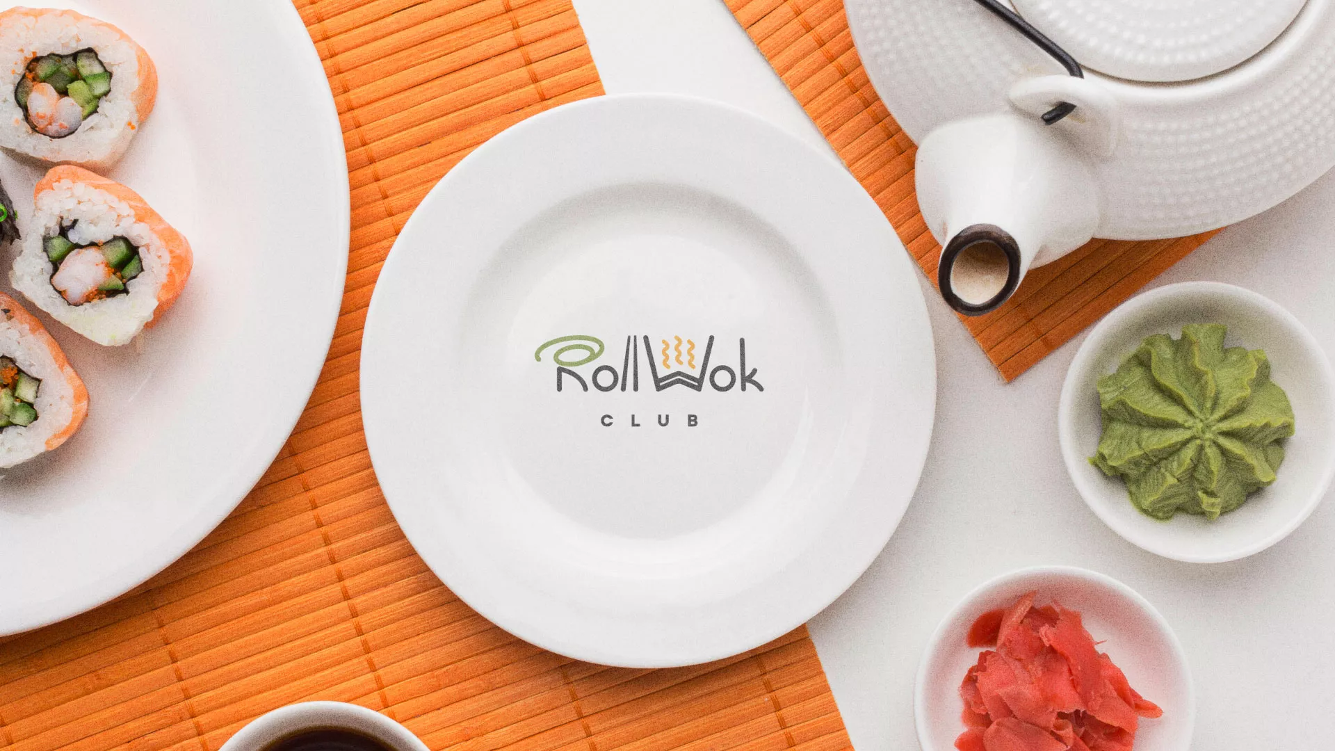 Разработка логотипа и фирменного стиля в Кирсанове для суши-бара «Roll Wok Club» Разработка логотипа и фирменного стиля в Кирсанове для суши-бара «Roll Wok Club»